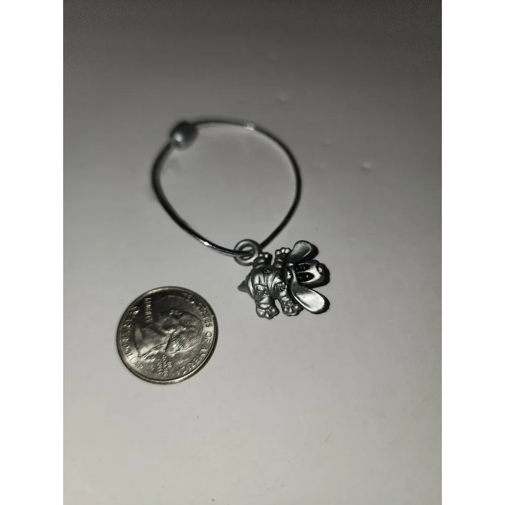 Vintage Plastic Pound Puppies Charm‎